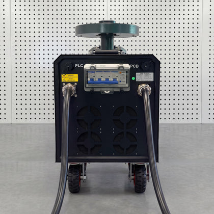 Rear view of a portable DC fast charger showing the circuit breaker panel